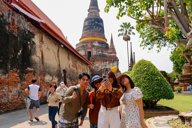 Ayutthaya Summer Palace and Temples Day Tour from Bangkok - Wat Mahathat and the famous Buddha head
