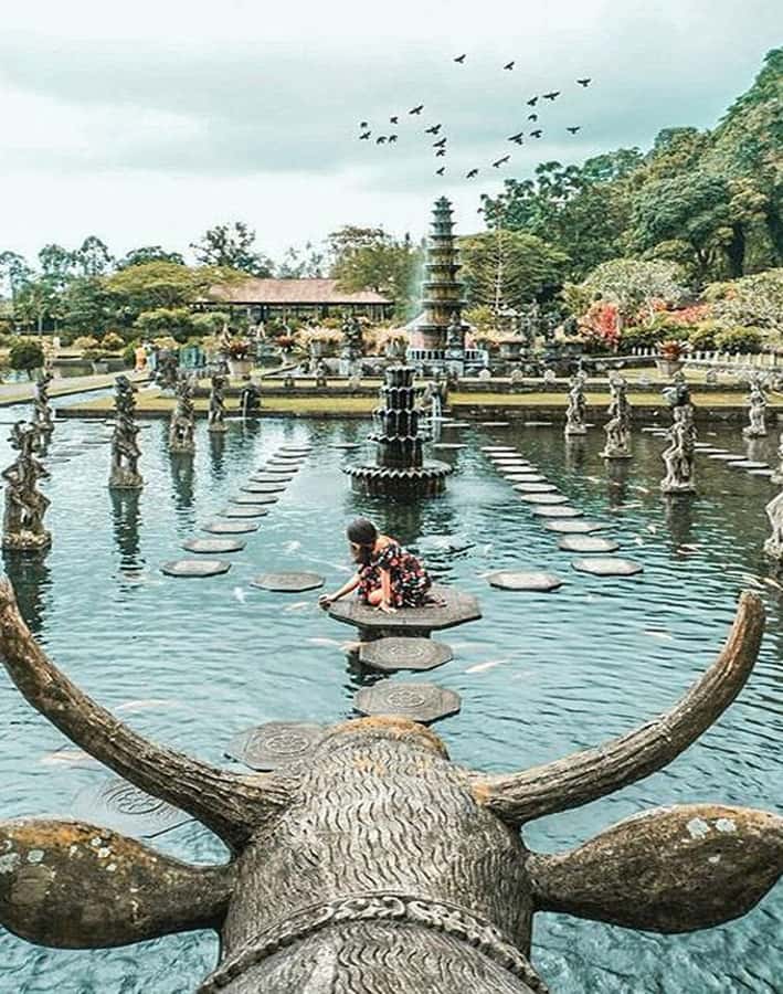 Bali:Heaven Gate, TirtaGangga Palace, and Beach Escape Tour - Tirta Gangga’s fountains, koi ponds, and royal setting
