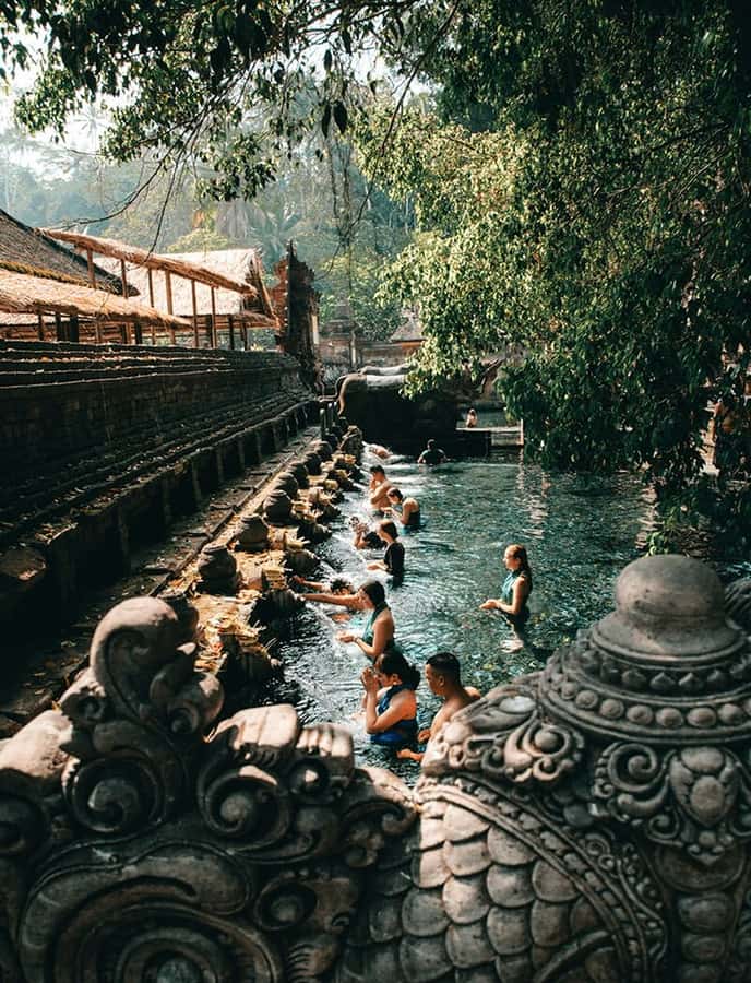 Bali: Trip to Tirta Gangga Palace and Tukad Cepung Waterfall - Tirta Gangga’s koi ponds and royal gardens