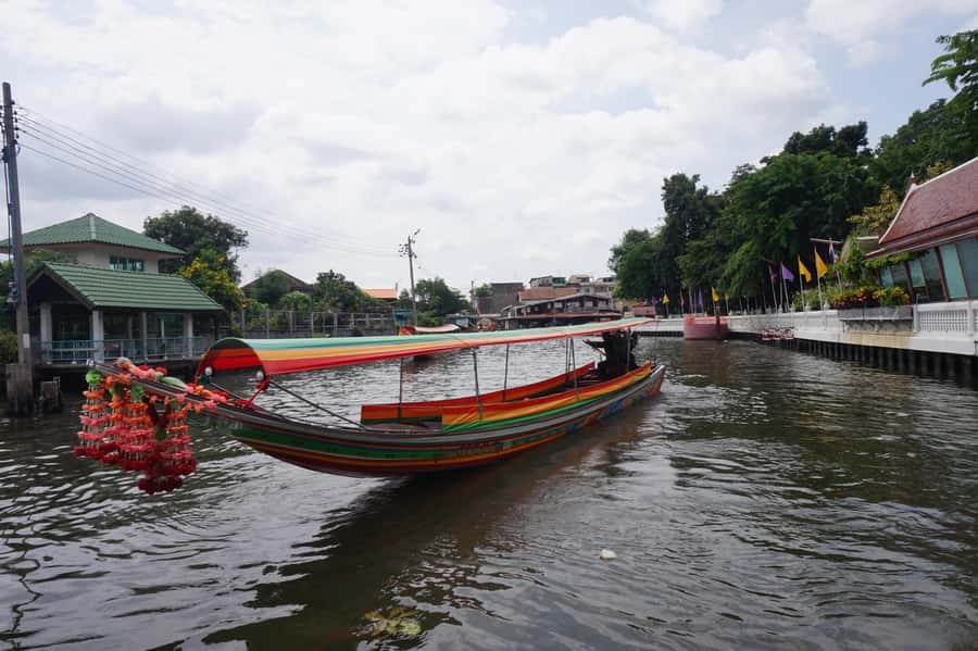 Bangkok: Grand Palace, Wat Pho & Long Tail Boat Tour - Wat Pho and the 46-meter Reclining Buddha