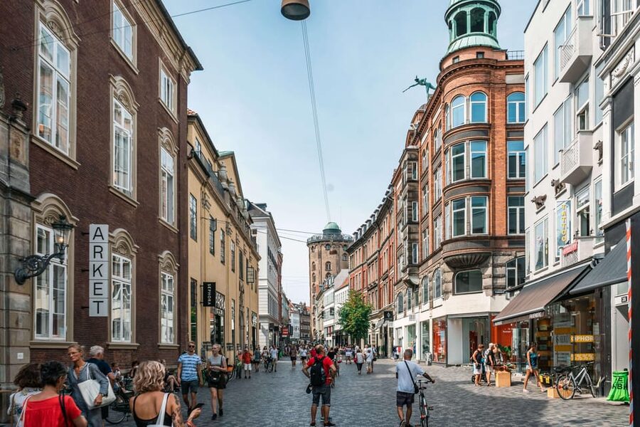 Copenhagen City & Christiansborg Palace Private Walking Tour - Nyhavn and Kongens Nytorv: color, commerce, and royal space