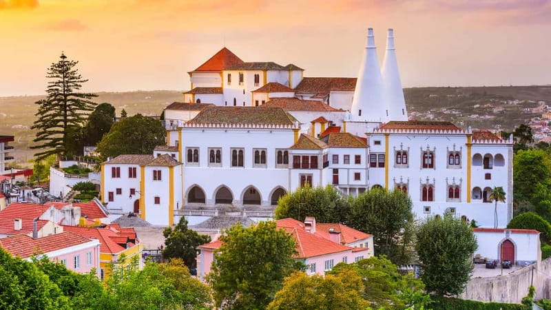 From Lisbon: Sintra, Pena Palace, Regaleira & Cabo Roca Tour - Sintra village, lunch, and the travesseiro stop