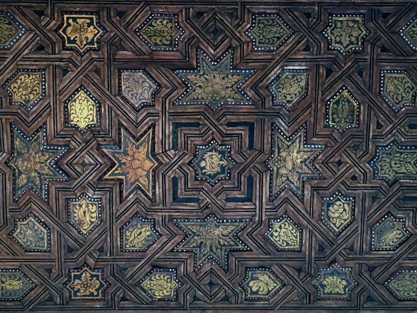 Granada: Alhambra Guided Tour w/ Nasrid Palaces & City Pass - Nine bus rides and one tourist train trip