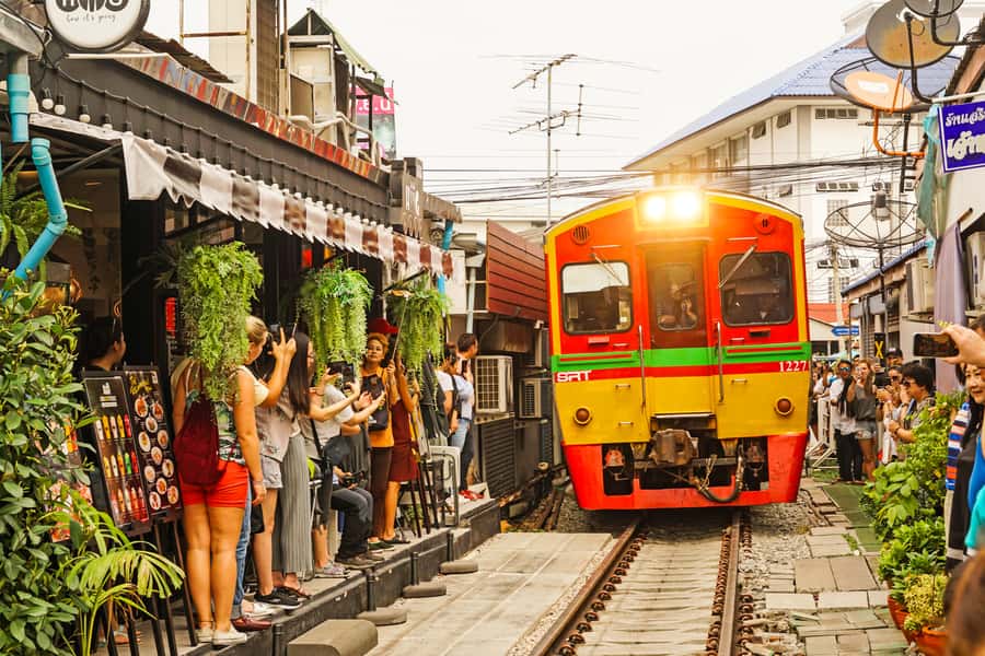 Grand Palace, Damnoen Floating Market & Maeklong Market Tour - Pickup, clothing, and practical planning