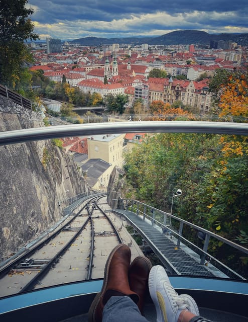 Graz: Funicular Ride & Schlossberg Picnic Experience - Exploring tunnels, paths, and old fortress ground