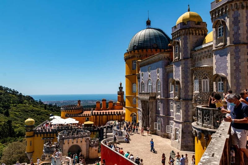 Lisbon: Pena Palace, Sintra, Cabo da Roca & Cascais Day Trip - Pena Palace: colorful walls and mountain views