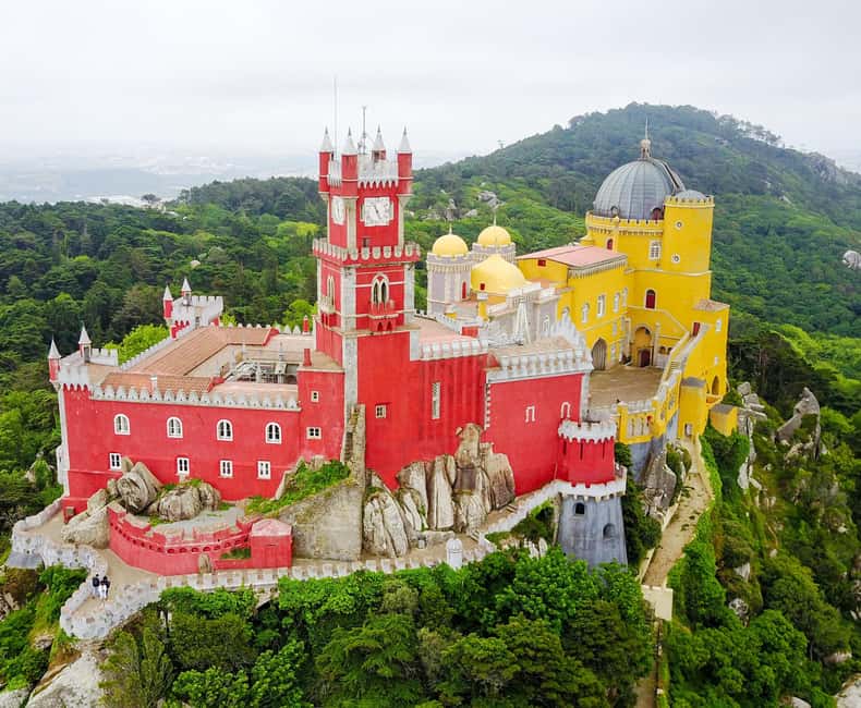 Lisbon: Pena Palace, Sintra, Roca & Cascais by Van - Pena Palace, colors above the Sintra hills