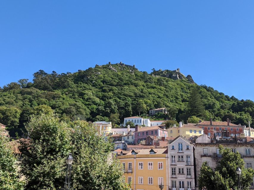 Lisbon: Sintra, Pena Palace, Cabo Roca Coast & Cascais Tour - Pena Palace: color, towers, and busy corridors