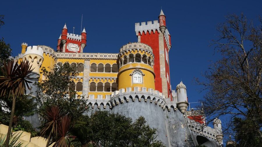 Lisbon: Sintra, Pena Palace, Cabo Roca Coast & Cascais Tour - The transport and guide experience