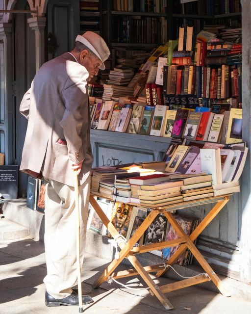Madrid: Old Town, Poets District, and Royal Palace Tour - Plaza Mayor, Cuchilleros Arch, and Madrid’s old lanes
