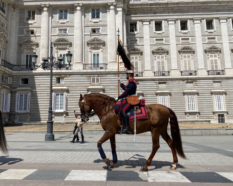 Madrid: Royal Palace Guided Shared Group Tour - The grand staircase and the palace’s sense of ceremony