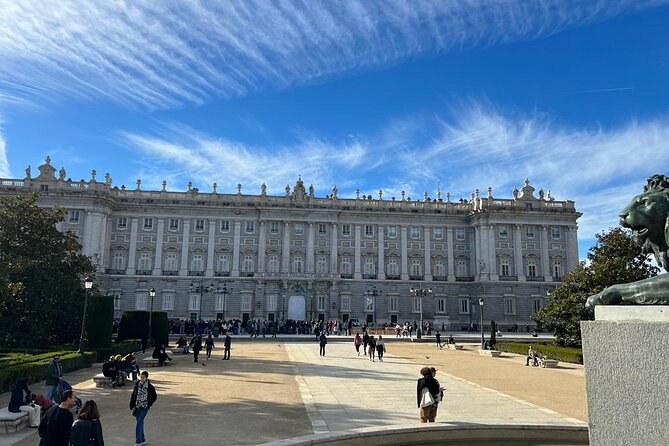Madrid: Royal Palace Guided Tour with Skip the Line Ticket - The palace rooms, symbolism, and royal stories