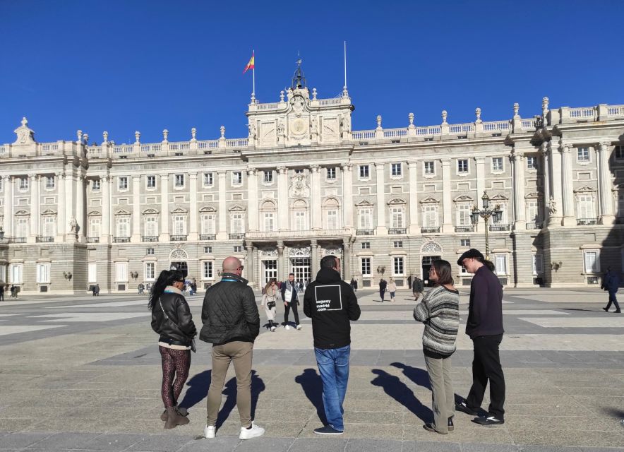 Madrid: Small-Group Royal Palace Guided Tour (Up to 8) - Entering the Royal Palace through its grand public rooms