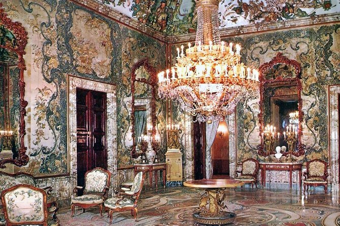 Royal Palace + Old City Madrid Exclusive Guided Walking Tour - Arco de Cuchilleros, Plaza Mayor, and market Madrid