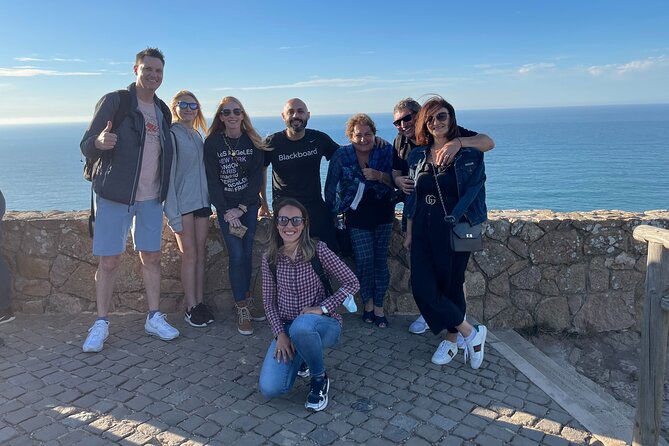 Sintra Tour with Pena Palace and Regaleira All Tickets Included - Pena Palace: color, royal rooms, and mountain views