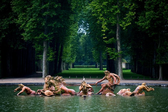 Versailles Palace and Gardens Half Day Guided Tour from Paris - The Place dArmes and Louis XIVs statue