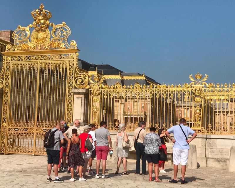 Versailles: Palace Guided Tour with Skip-the-Line Ticket - Meeting the guide at the statue of Louis XIV